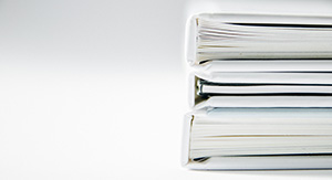 stack of white notebooks