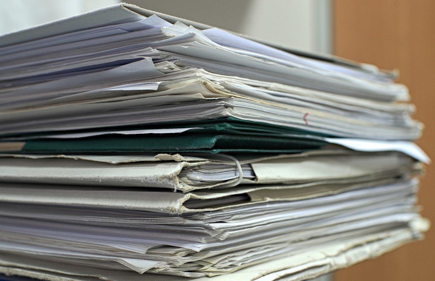 stack of HOA governing documents